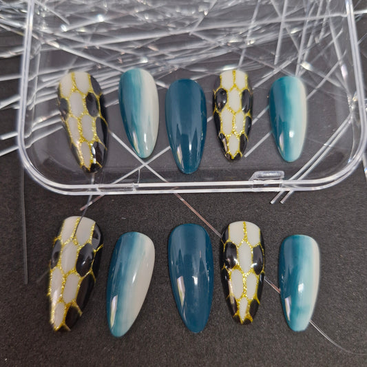 Oceanic Opulence: Press-On Nails with Teal Ombre and Golden Net Accents